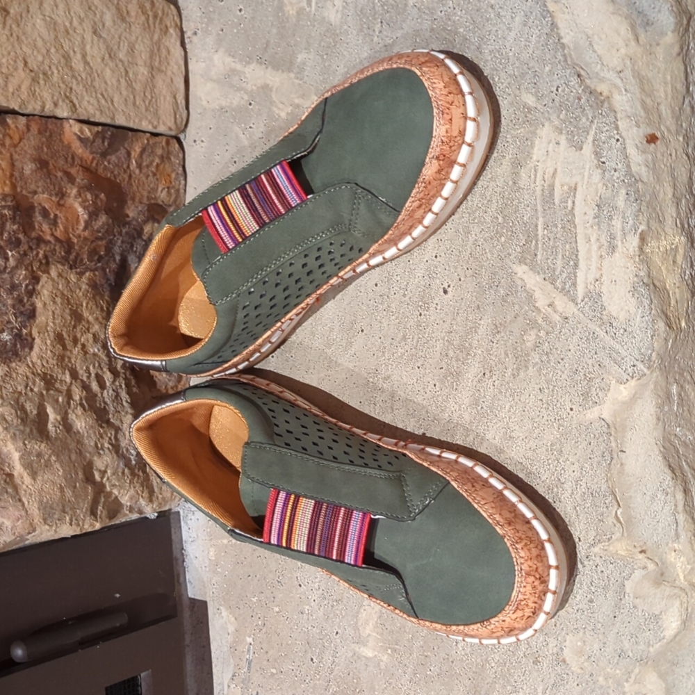 Green slip on sneakers